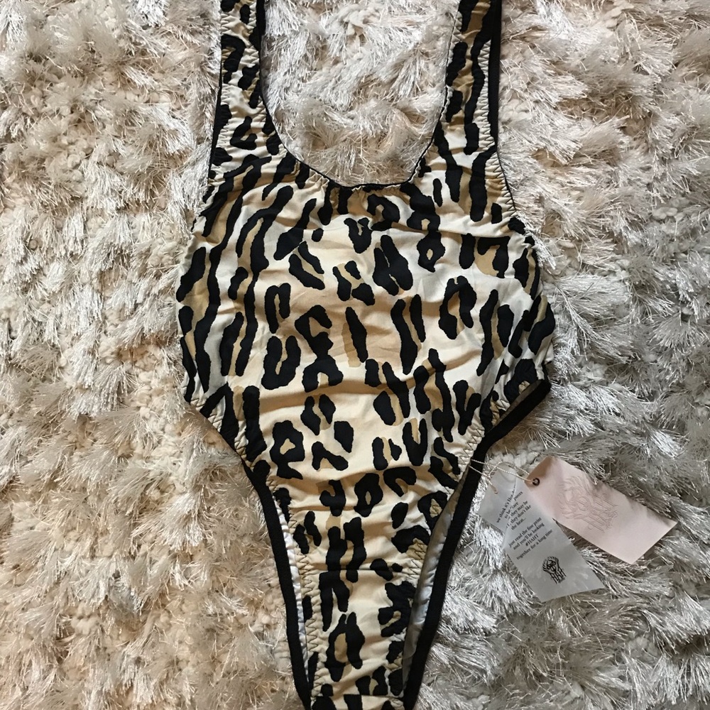 We are HAH cheetah bodysuit